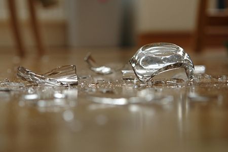 Broken Glass in Kitchen with Open Shelves