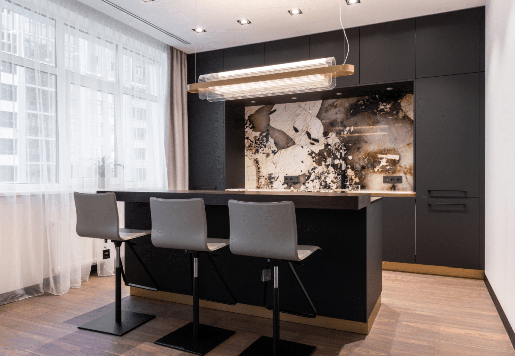 open space kitchen black flat panel cabinets